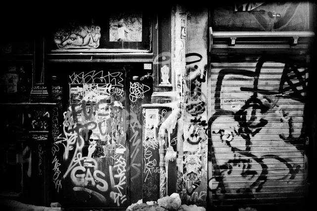 Graffiti-covered doorway, from Polyphony
